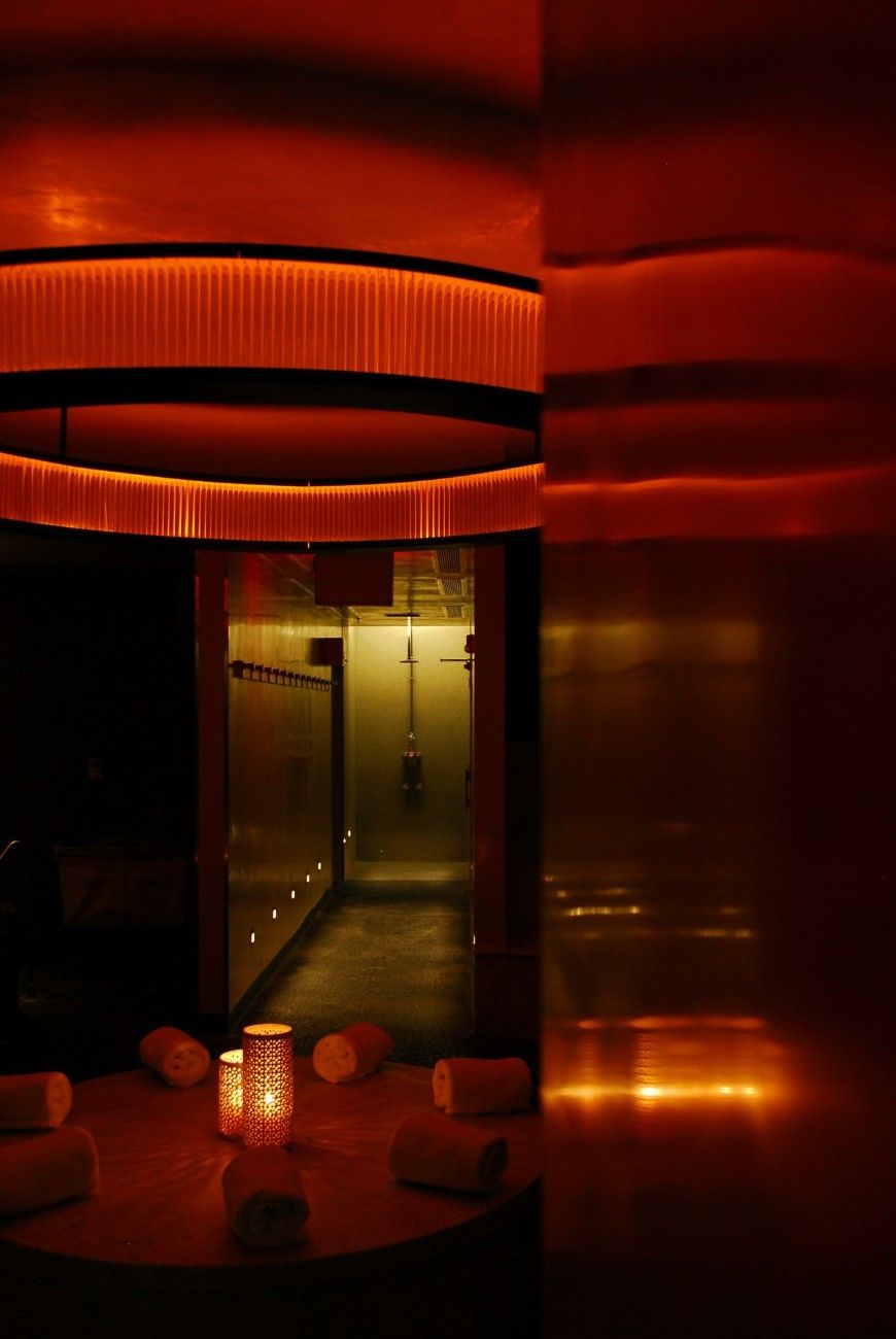 red and brown tunnel with glass windows